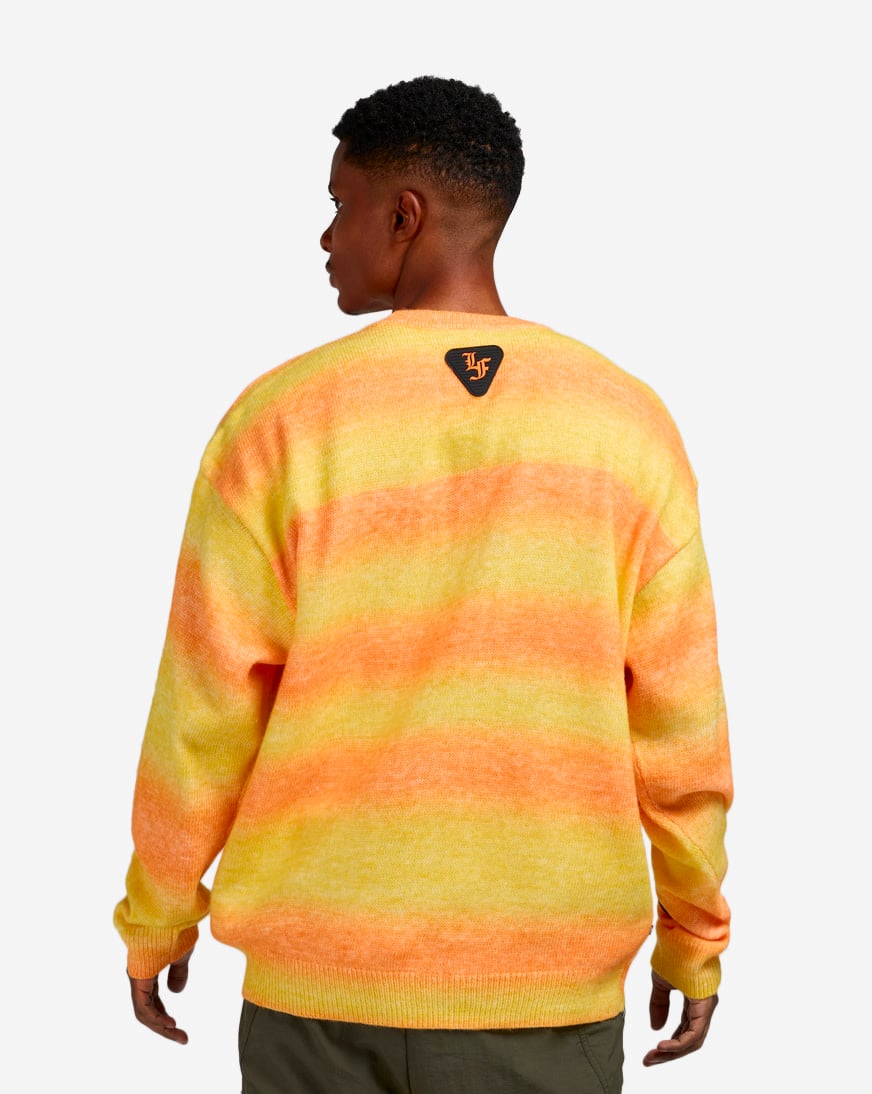 Shop Puma LaFrancé Heem Knit Sweater 63247601 orange | SNIPES USA
