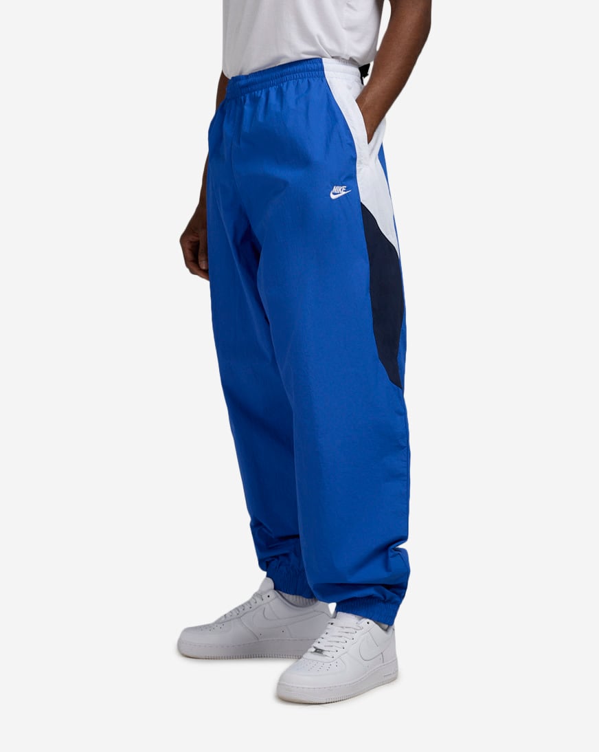 Shop Nike Club Woven Track Pant HQ6114-480 blue | SNIPES USA