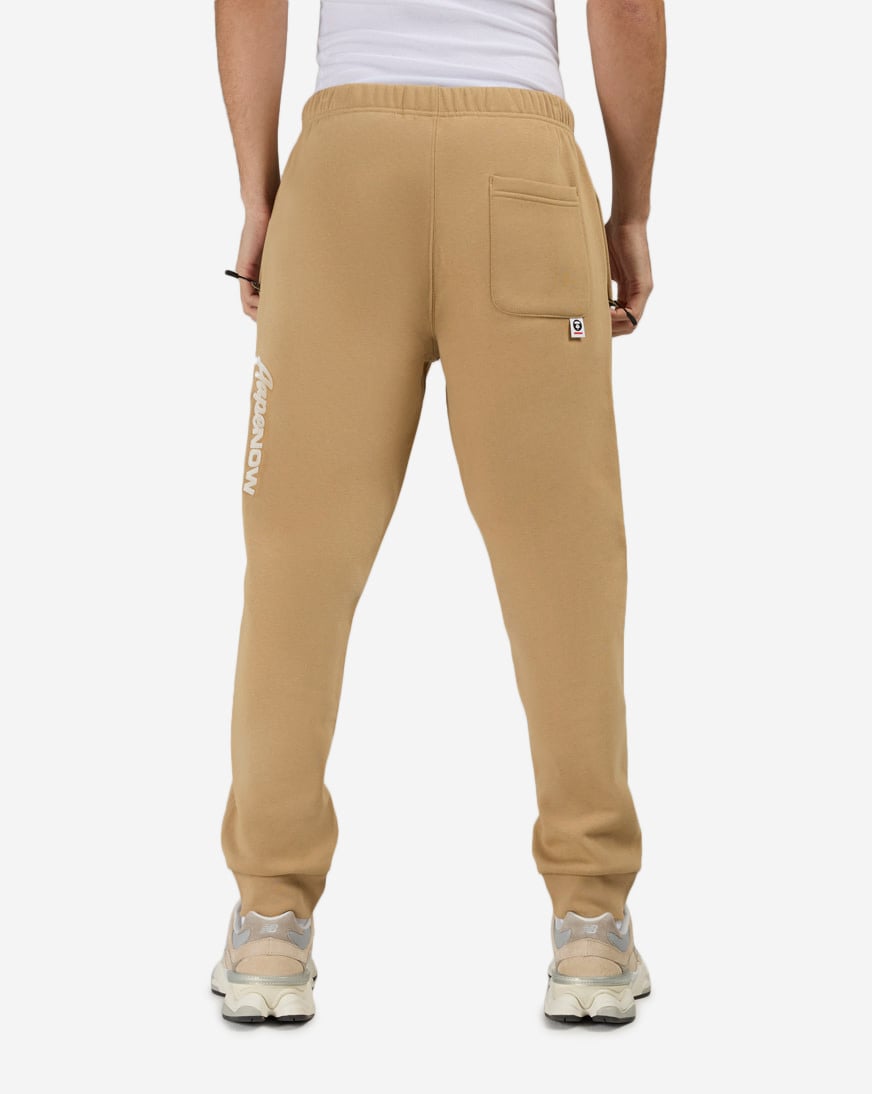 Shop AAPE Now Fleece Sweatpants AAPPTMC636XXP-BGX beige | SNIPES USA