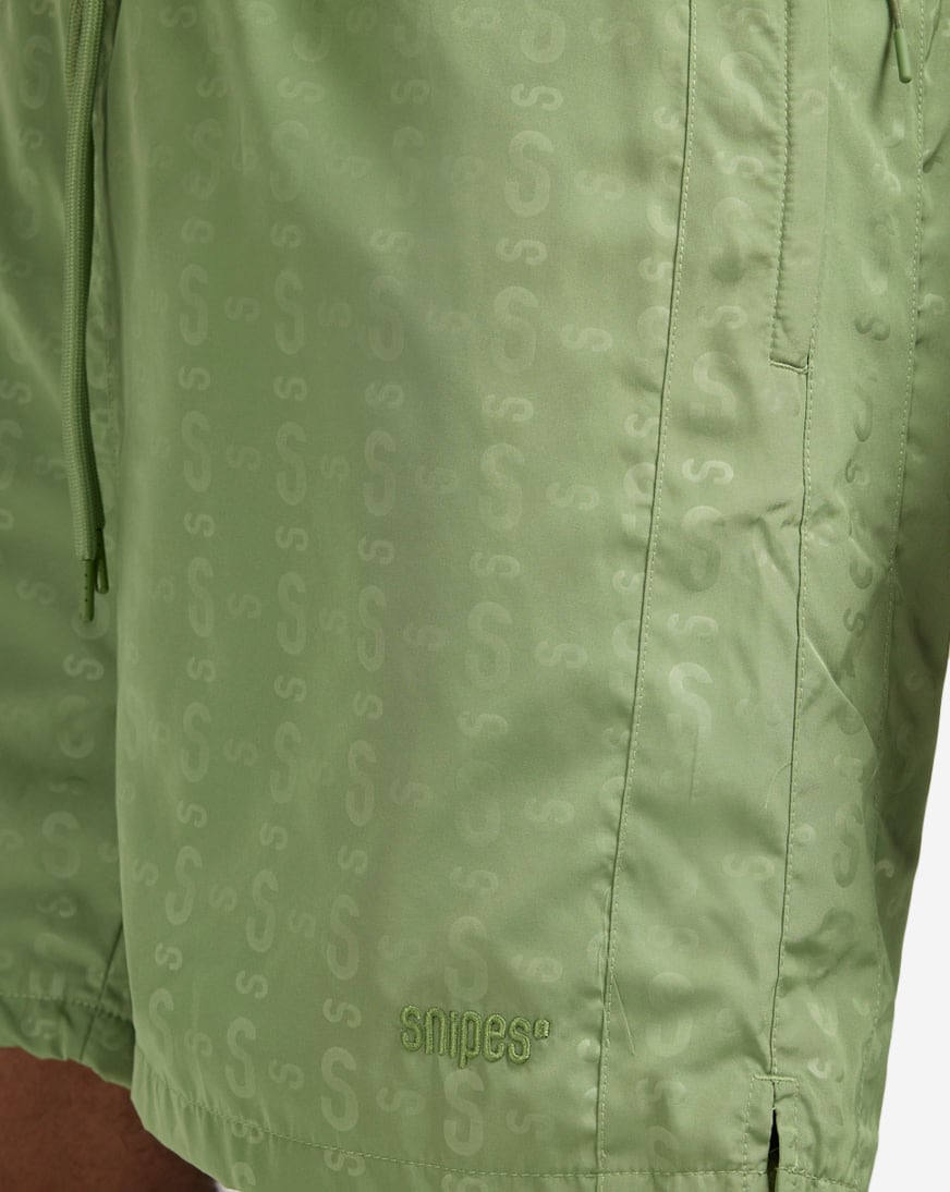 Shop SNIPES Logo Repeat Nylon shorts SNQ224003M-GRN green