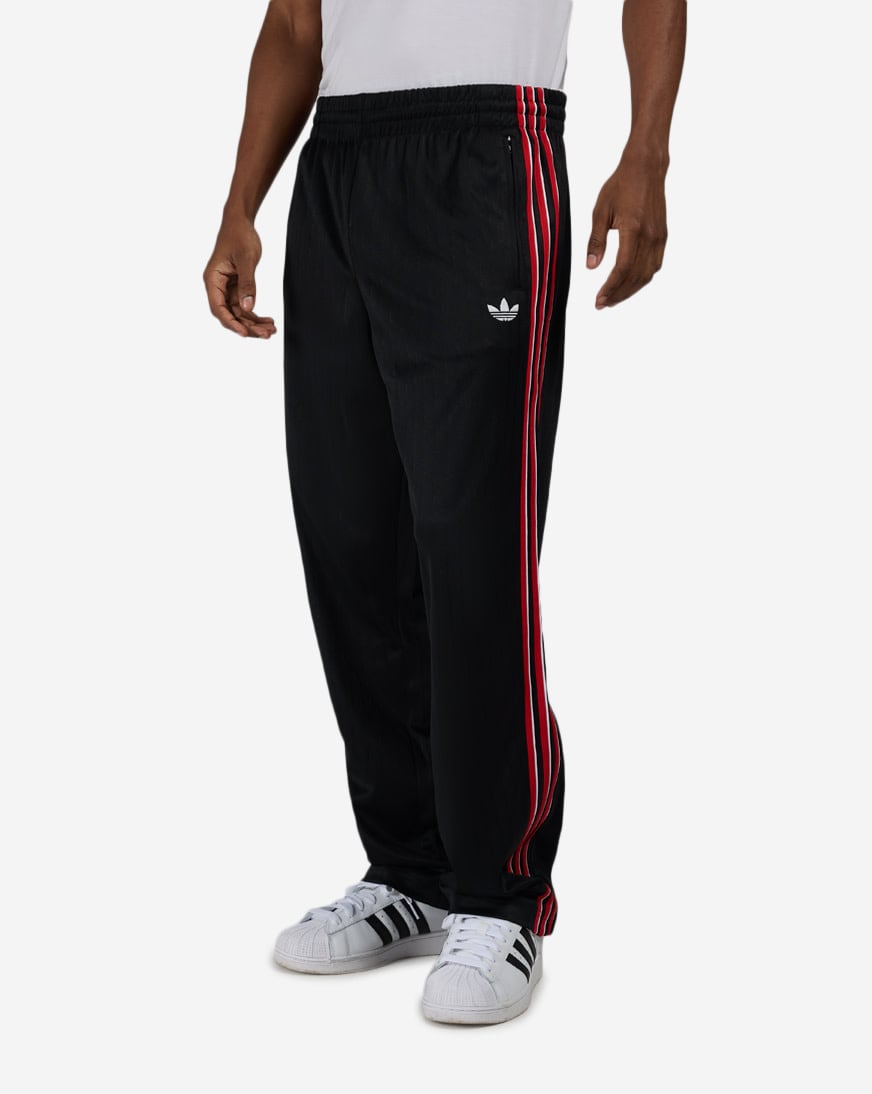Shop adidas Firebird Loose Pinstripes Track Pants KE3457 black