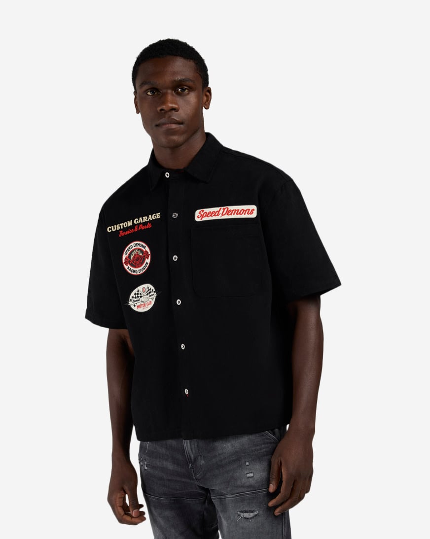 Shop Decibel Motorcycle Woven Top SSWT004-BLK black | SNIPES USA