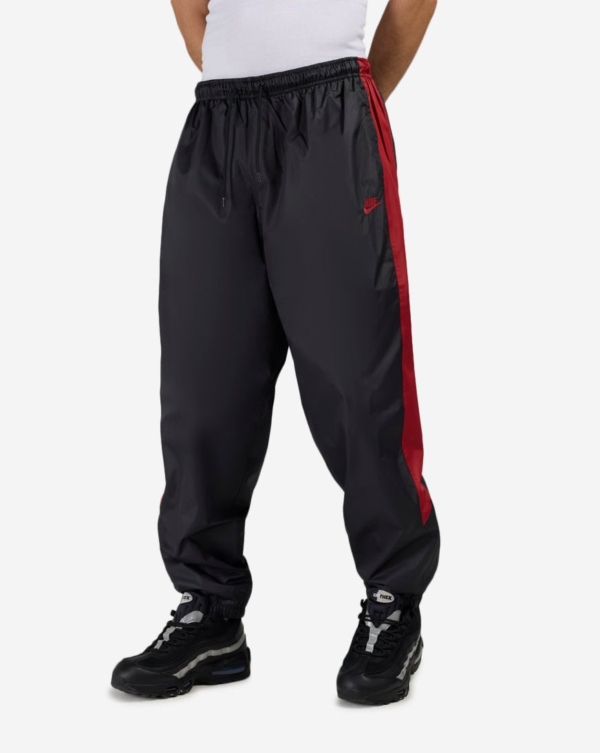 Shop Nike Windrunner Lined Pants HV8371-013 black | SNIPES USA