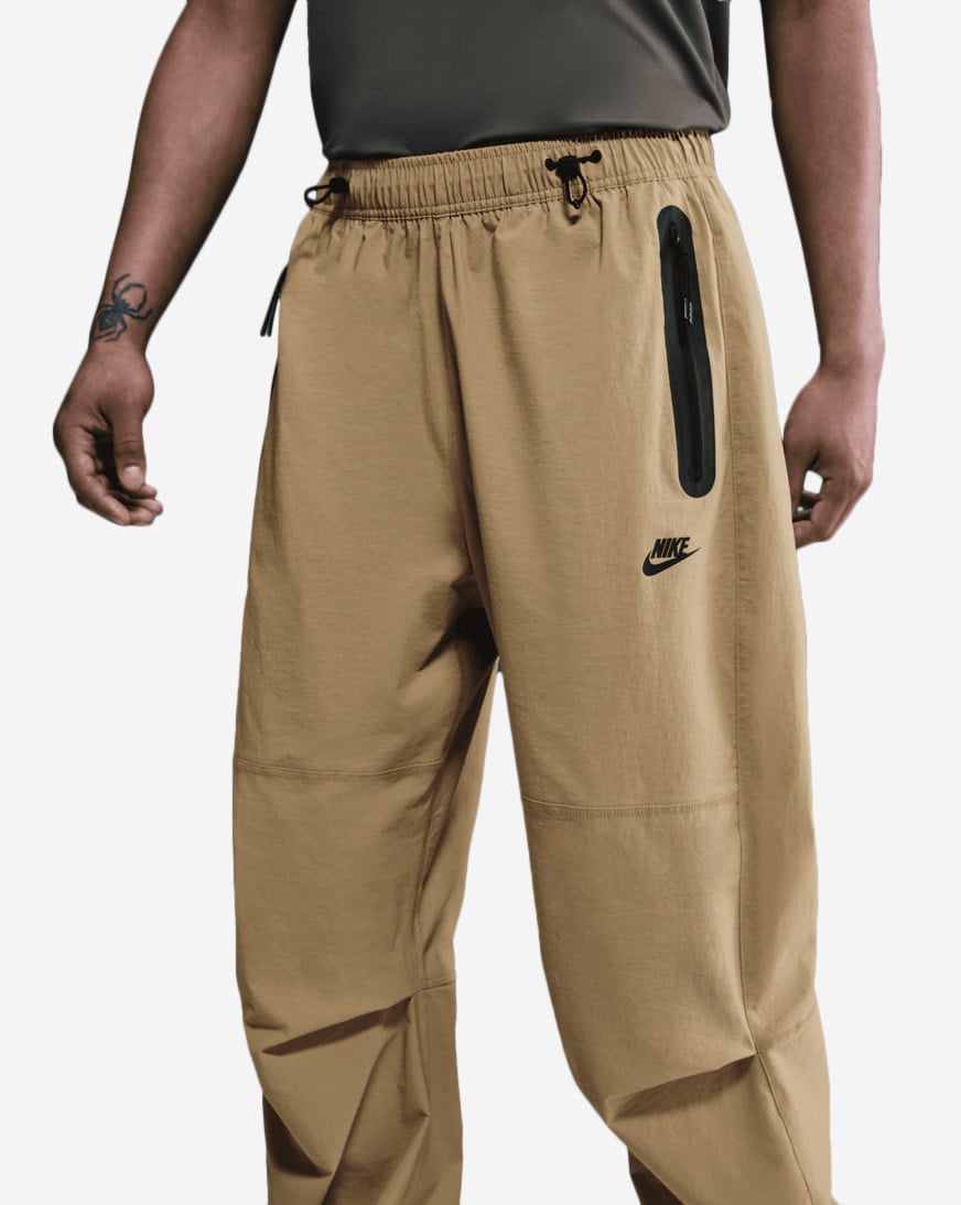Shop Nike Tech Dri-FIT Woven Color-Block Oversized Pants HM7158
