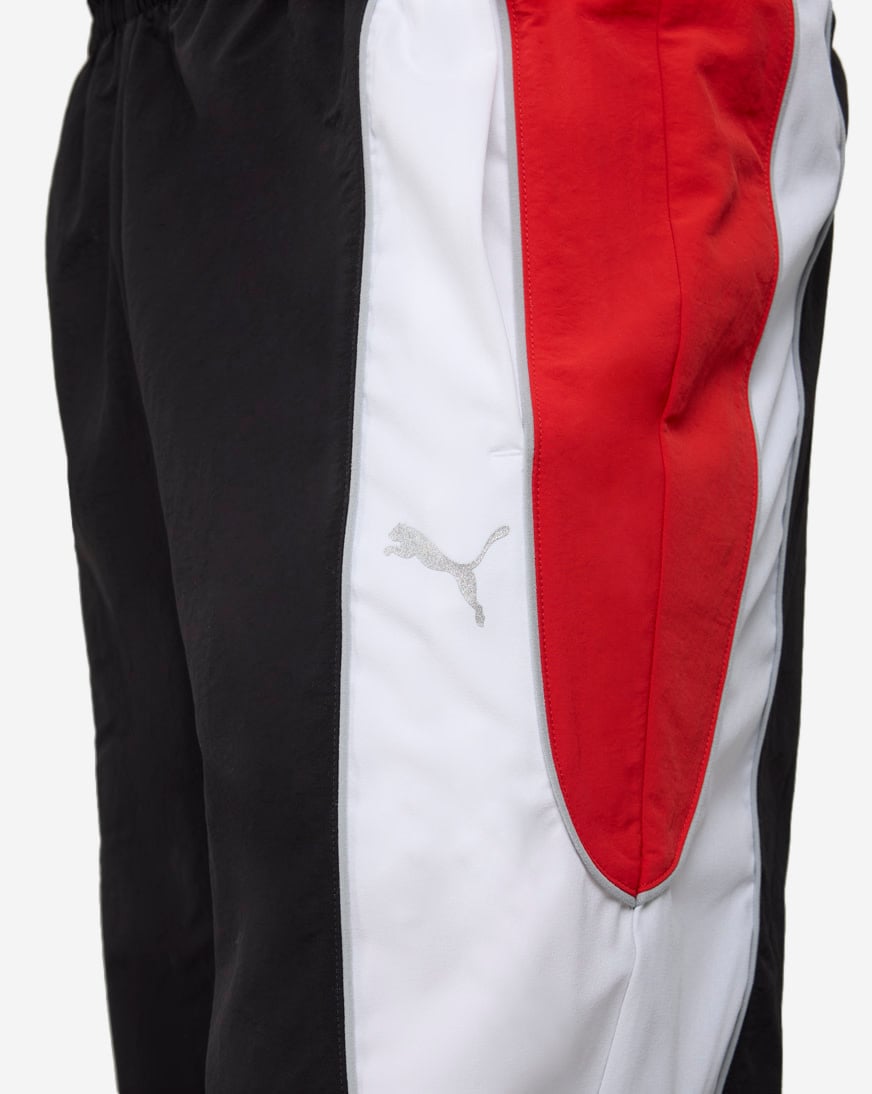 Shop Puma PUMATECH-X Colorblock Relaxed Track Pant 63434701 black
