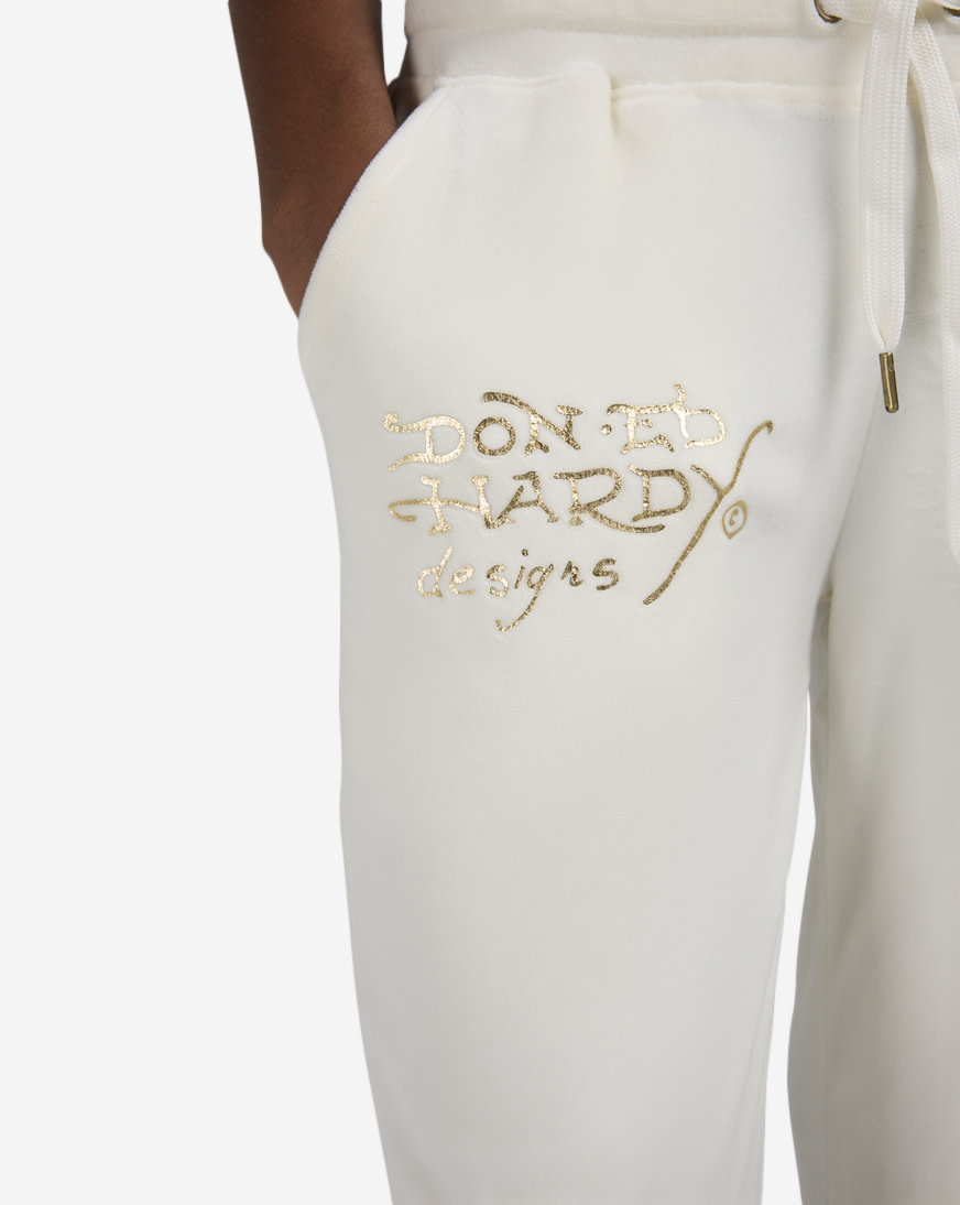 Shop Ed Hardy Tiger Crown Velour Pants EHW8205-8 cream | SNIPES USA