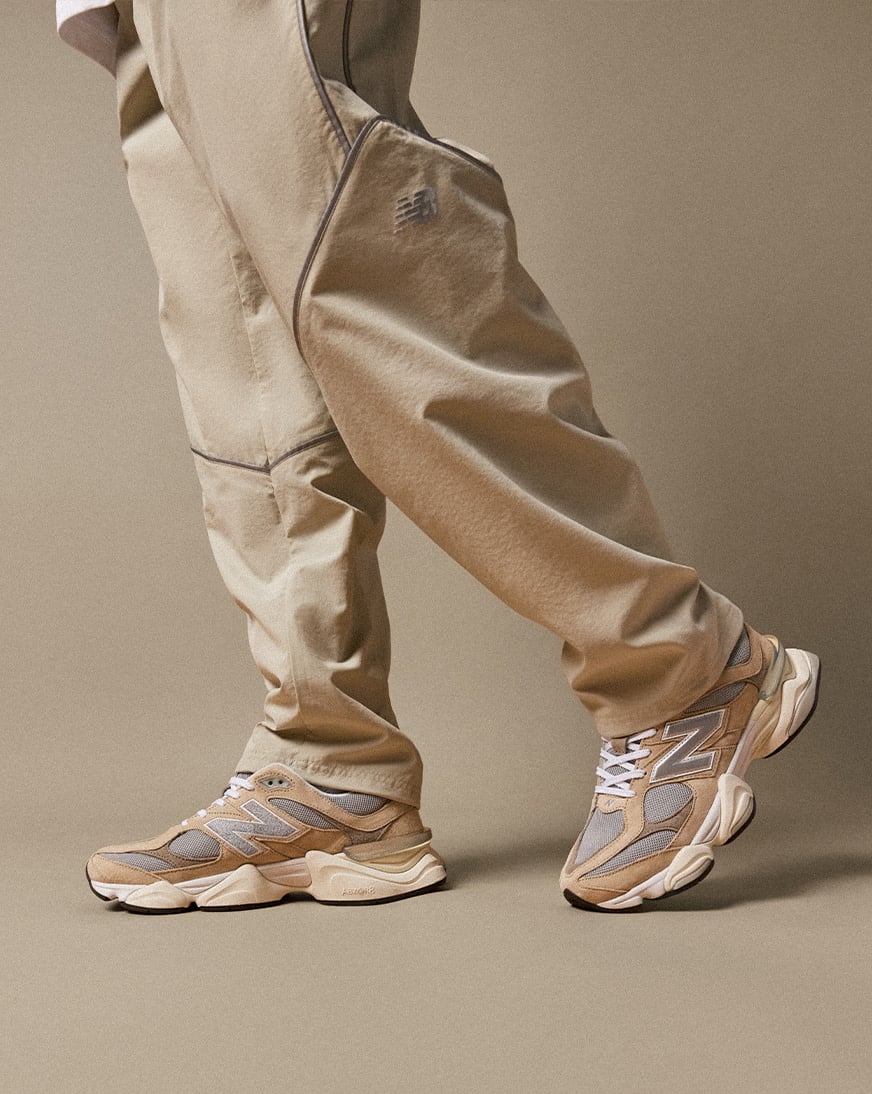 Shop New Balance Reflective Woven Pants MB61Q27Z-SHY beige