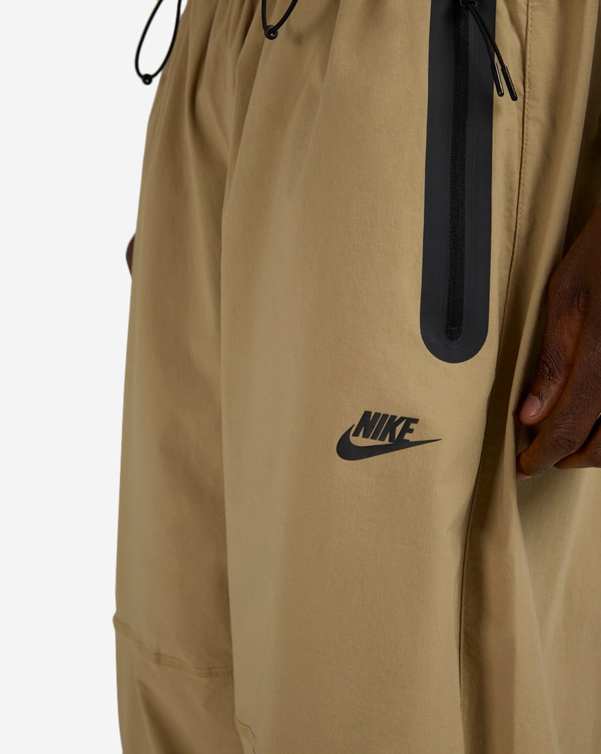 Shop Nike Tech Dri-FIT Woven Color-Block Oversized Pants HM7158
