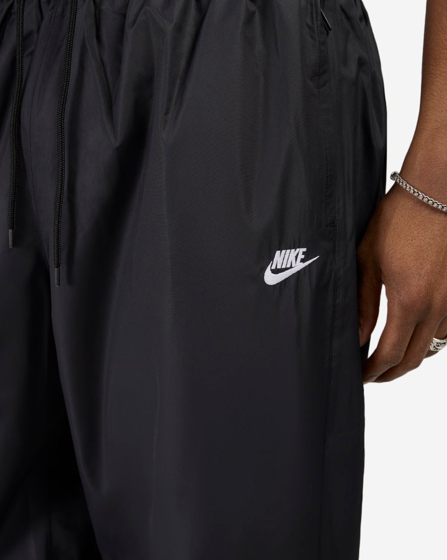 Shop Nike Windrunner Lined Pants HV8371-010 black | SNIPES USA