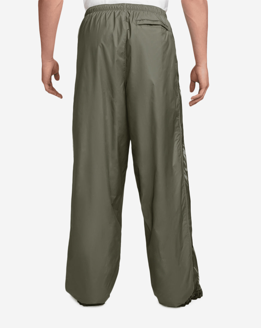 Shop Nike Graphic Track Pants IO1736-222 green | SNIPES USA