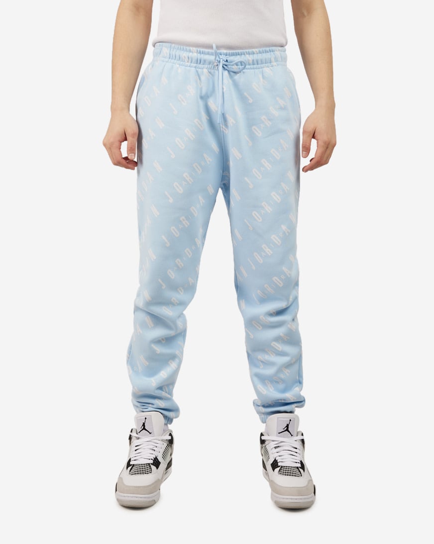 Shop Jordan Essential All Over Print Graphics Fleece Pants