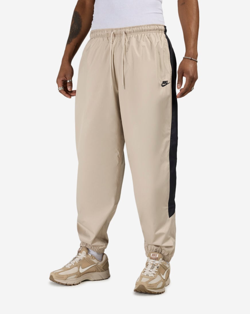 Shop Nike Windrunner Lined Pants HV8371-236 cream | SNIPES USA