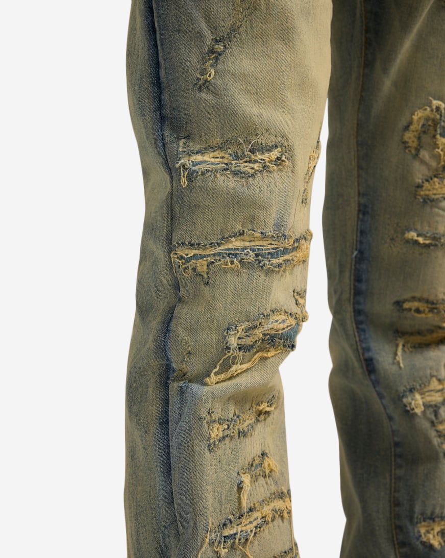 Shop Jordan Craig Distressed Rip and Repair Stacked Jeans