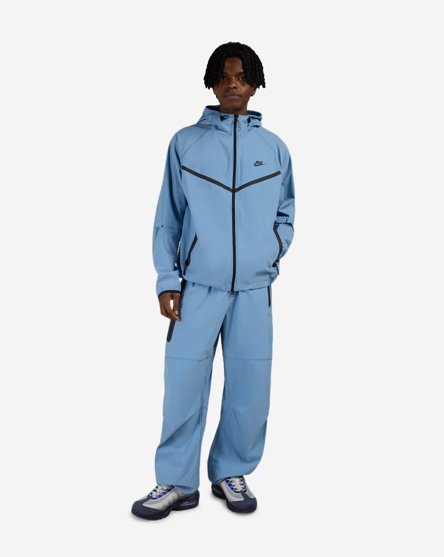 Shop Nike Tech Dri-FIT Woven Pants IU6966-486 blue | SNIPES USA