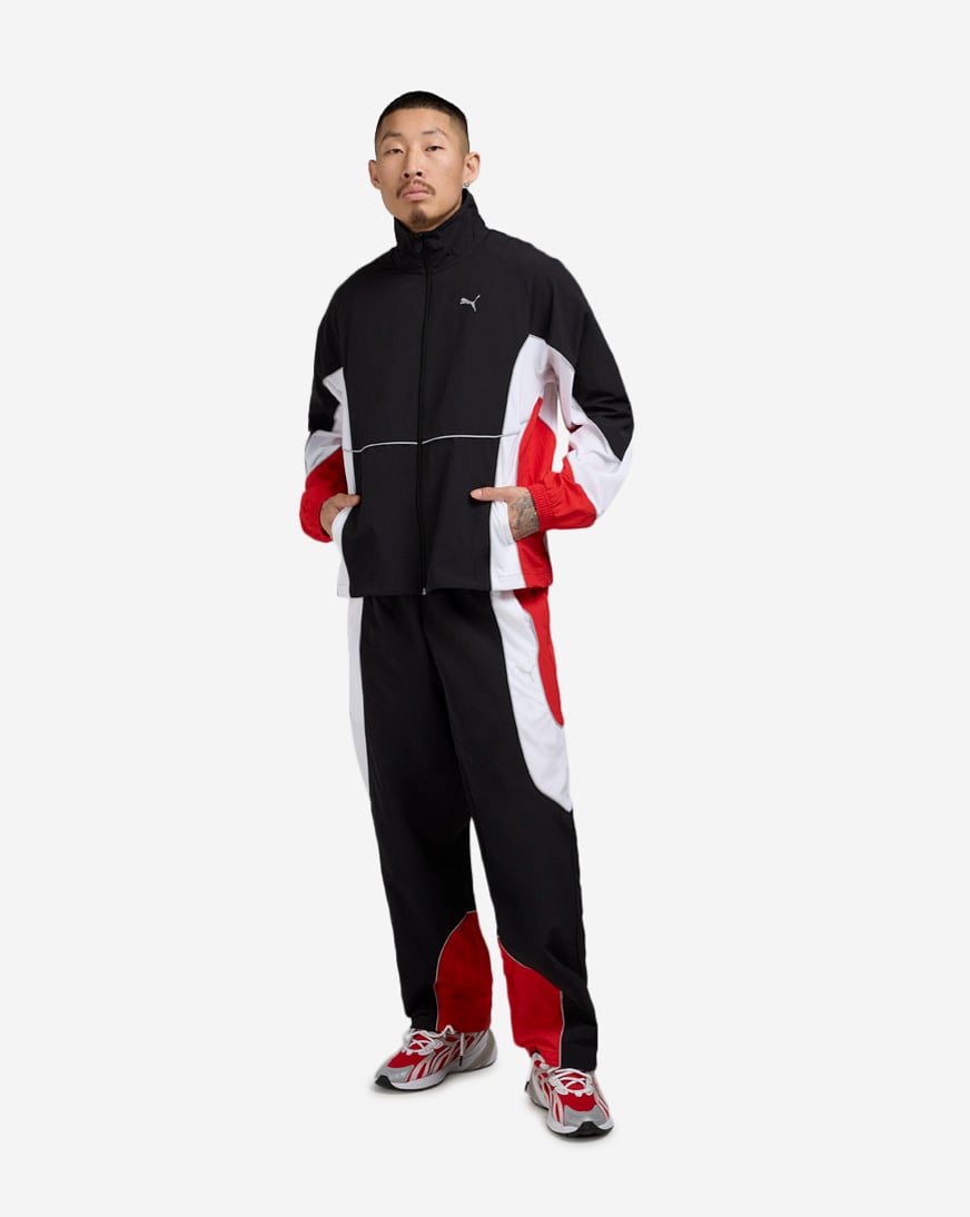 Shop Puma PUMATECH-X Colorblock Relaxed Track Pant 63434701 black