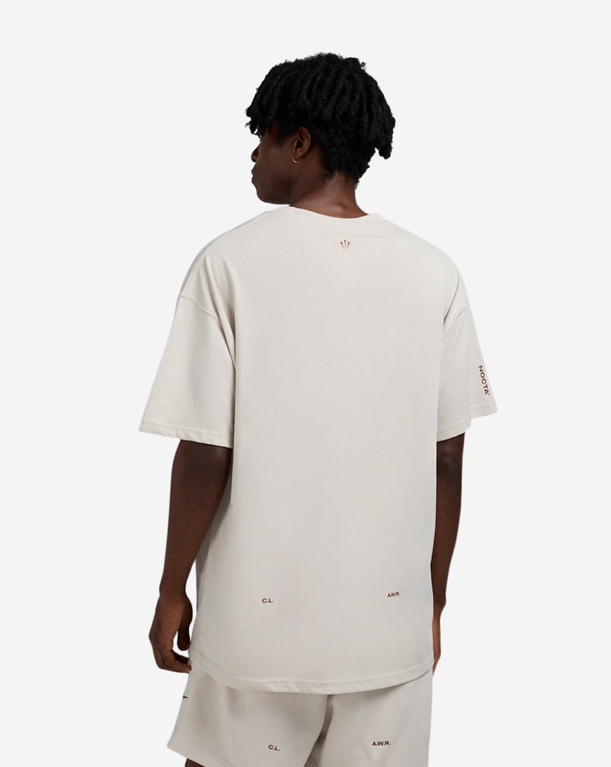 Shop Nike NOCTA T-Shirt IB5673-104 cream | SNIPES USA