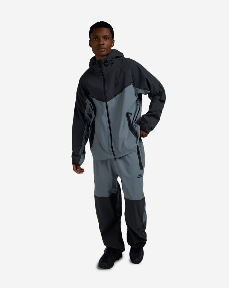 Shop Nike Tech Woven Oversized Pants HM7158-065 grey | SNIPES USA