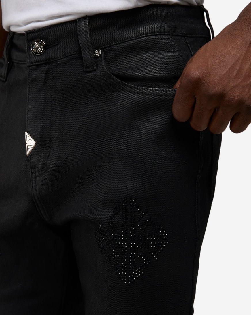 Shop Guapi Monogram Embellished Denim Jeans OBSIDIAN-BLK